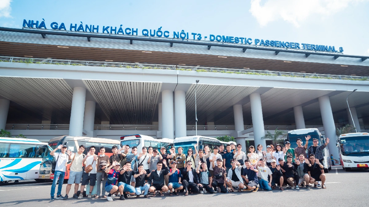Group photo of a delegation in front of the modern "DOMESTIC PASSENGER TERMINAL 3